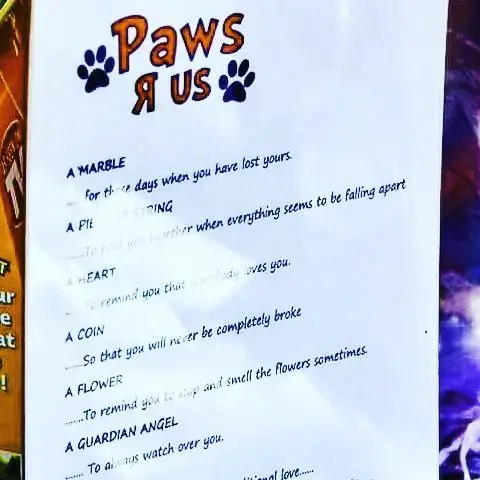 A photo of an A4 paper with a poem written on relating to small gifts that the Paws-R-Us dog rescue sells at their weekend markets.